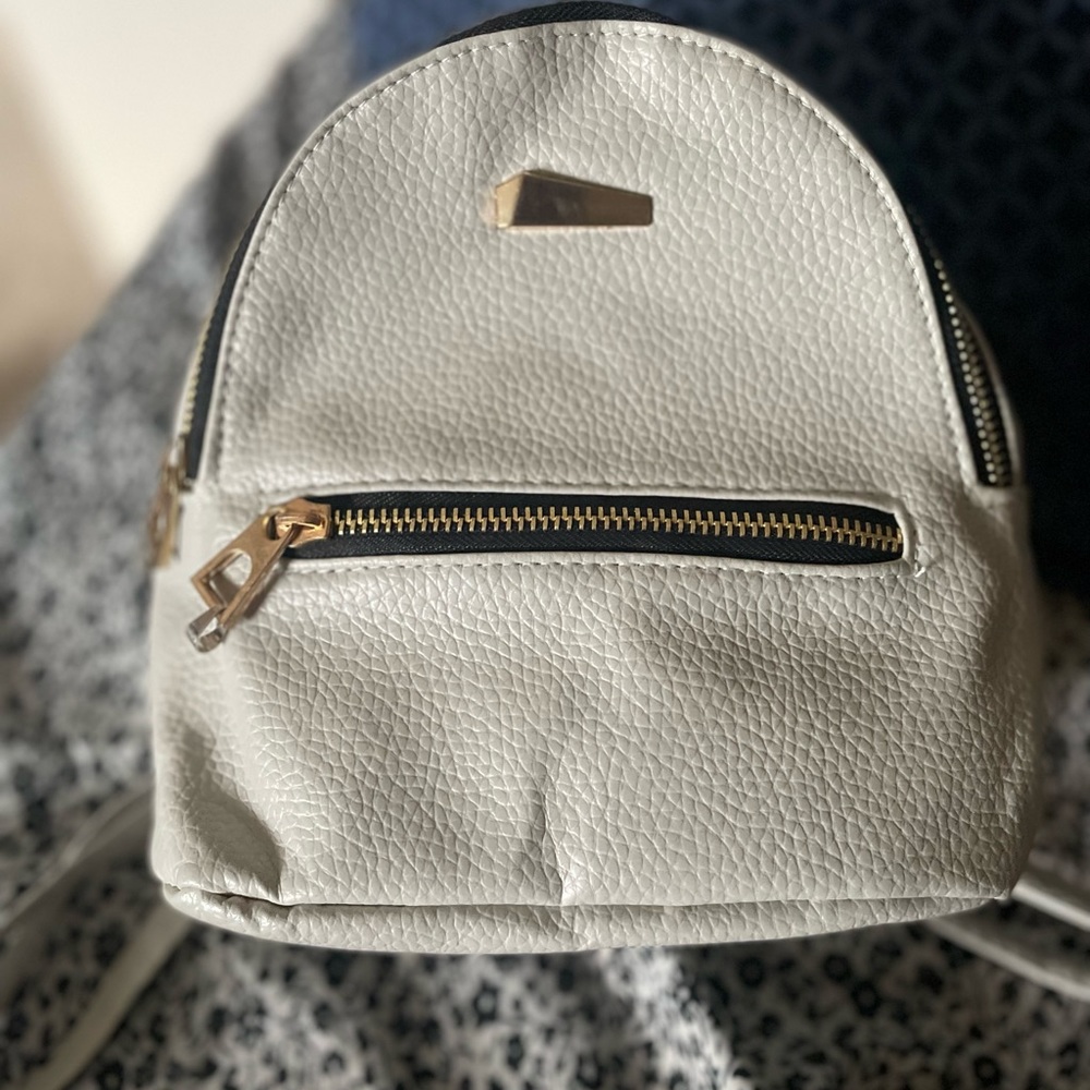 Mini Backpack with tiny gold bar
